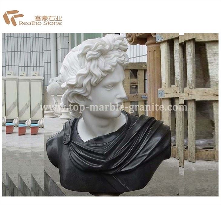 white and black marble statue